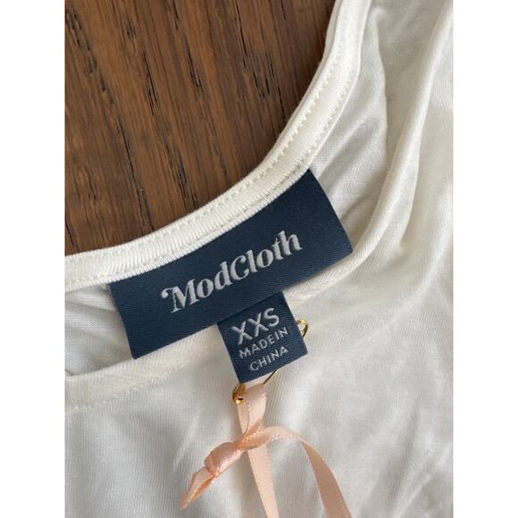 ModCloth Sleeveless Tie Shoulder Peplum Direction Knit Tank Off White XXS NWT - Picture 7 of 12